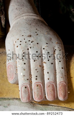ancient buddha hand statue in yala cave temple, thailand