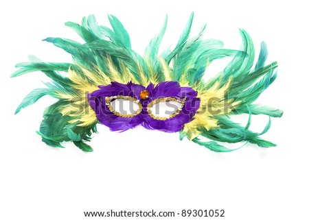 Colorful Mardi Gras mask of feathers isolated on white