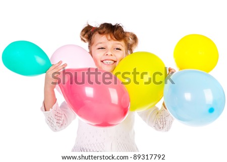 laughing girl with color balloons