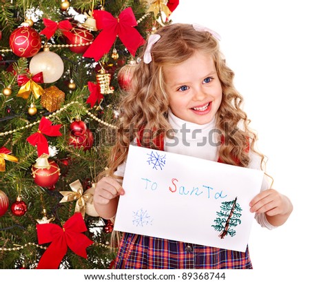 Child with gift box near Christmas tree.Isolated.