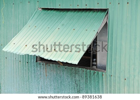 Grunge zinc wall with window