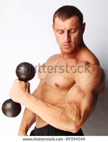 Image of bodybuilder showing his  muscular body