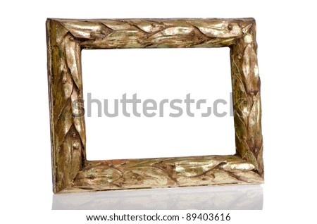 Golden photo frame on top of white reflective surface.