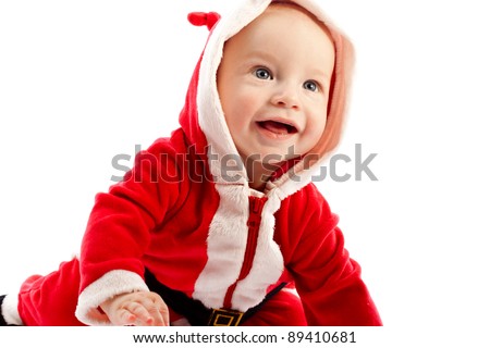Baby in santa-costume on a white background