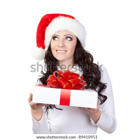woman in santa hat dreaming over white background