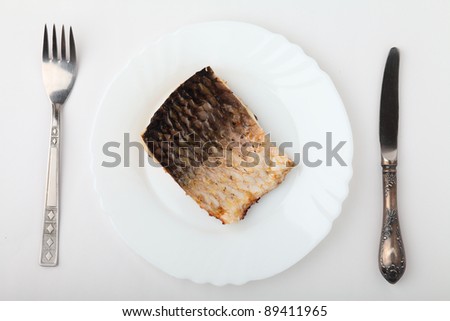 Fish in plate.