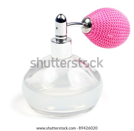 Vintage perfume spray bottle on white background