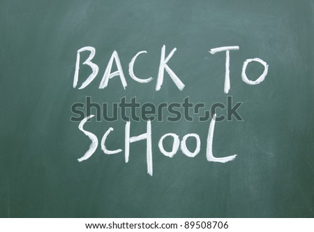 back to school title drawn with chalk on the blackboard