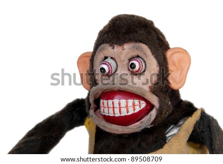 Damaged mechanical chimp with uneven eyes