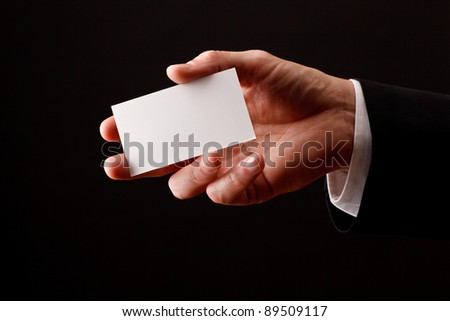 Male hand holding blank business card. Add your own design
