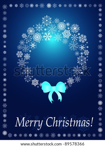 Christmas wreath on the blue background