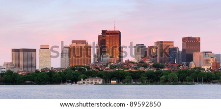 Boston Charles River sunset panorama with urban skyline and skyscrapers