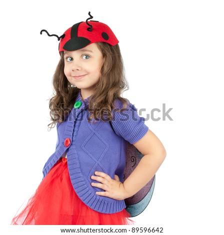 cute little girl wearing ladybug costume, smiling and looking into the camera. Studio shot, isolated on white background.