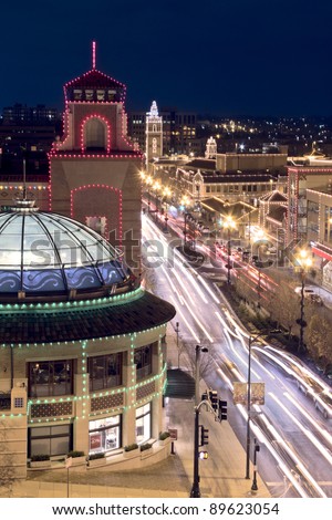 A view of the Kansas City Country Club Plaza Christmas lights and the skyline of downtown Kansas City, Missouri