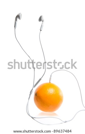 Orange and headphones. Listening to your health. Over white background