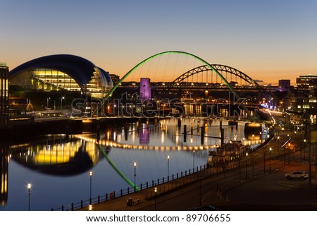 Tyne bridges at twilight / Elevated view of Newcastle and Gatehead quays just as the sun has set Royalty-Free Stock Photo #89706655