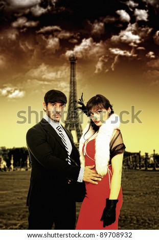 fashion portrait of retro sixties style young couple in Paris France