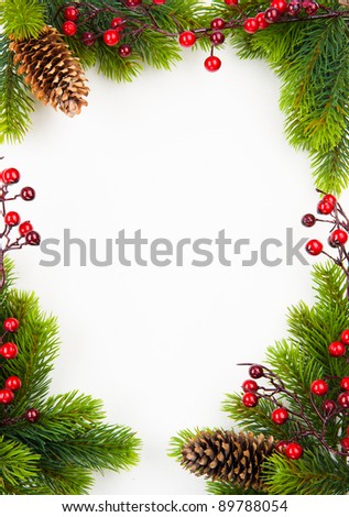  christmas frame with fir and Holly berry on old paper background