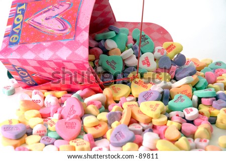 Candy Sweethearts spilling out of a decorated take out Chinese food container