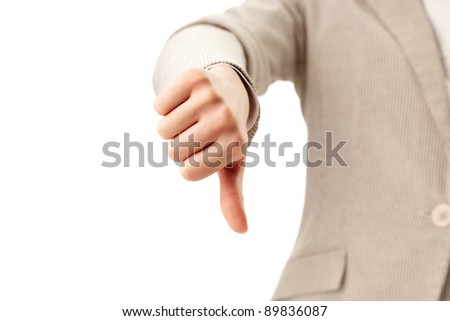Image of human hand showing thumb down in isolation