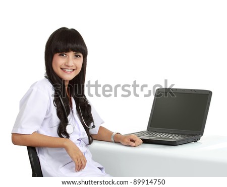 Female doctor at work use laptop in isolated background
