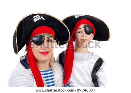 cute little boy and his pretty young mother in the pirate costumes