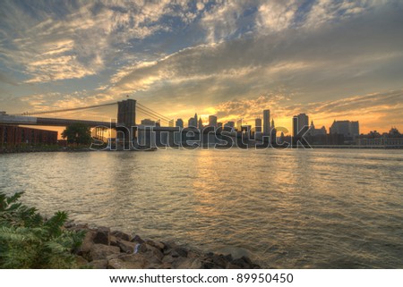 View of Brooklyn Bridge and Downtown Manhattan from across the East RIver.
