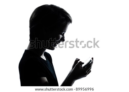one caucasian young teenager silhouette boy or girl telephone videophone video game  portrait in studio cut out isolated on white background
