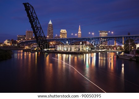 Boat on Cuyahoga River in downtown of Cleveland