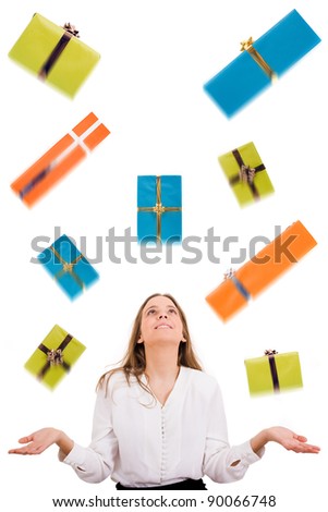Excited beautiful woman with many gift boxes