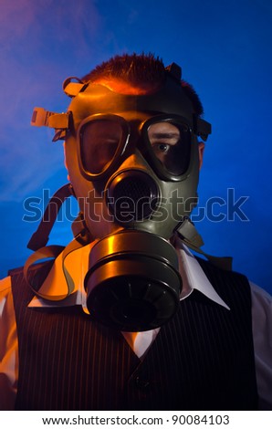 Man wearing a gas mask for protection against pollution