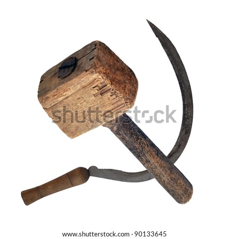 Old tools: sickle and wooden hammer mallet. Made in the USSR, Russia, Siberia, in the mid-20th century