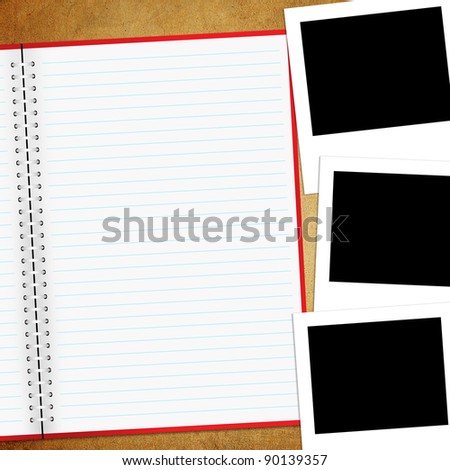 Blank notebook and photo old board background