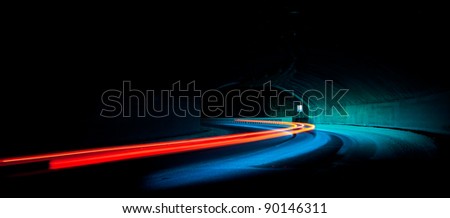 Car light trails in the tunnel. Very art image . Long exposure photo taken in a tunnel below Veliko Tarnovo