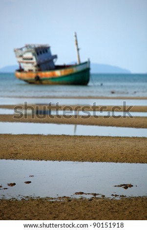 Deserted ship on the sea, Koh Mak, Trat, Thailand.