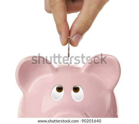 Piggy bank looking up for the coin isolated on white