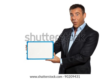 one caucasian business man holding showing whiteboard in studio isolated on white background