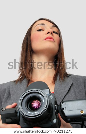 Woman in suit holding a Medium format Camera