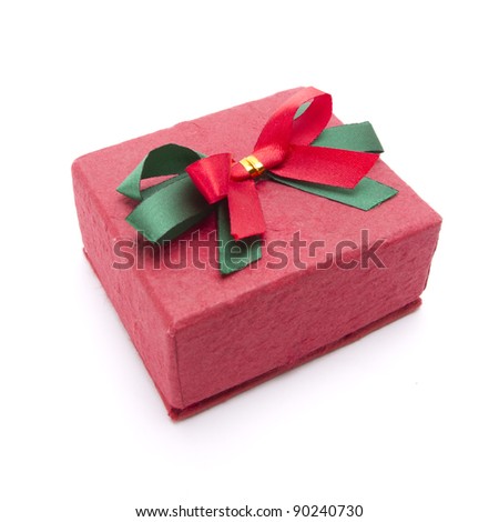 red gift box, red paper gift box with green and red ribbon attached.