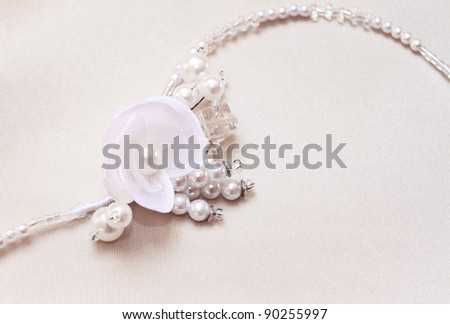 Macro of necklace , flower and pearl