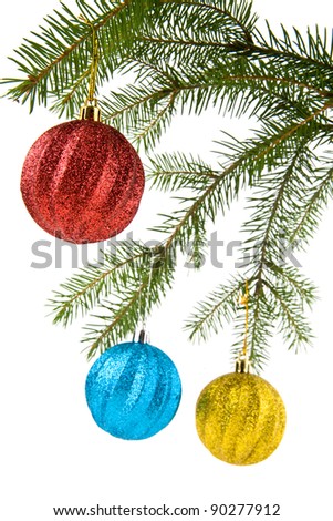 branch of fir-tree and ball on a white background