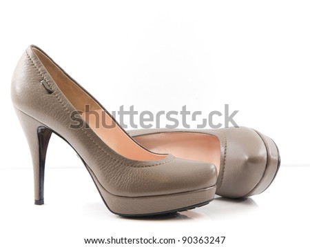 beige women's shoe on high heel, view from side. Isolated on white background Royalty-Free Stock Photo #90363247