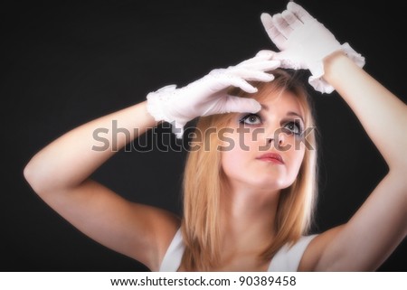 picture of beautiful woman in white gloves black background