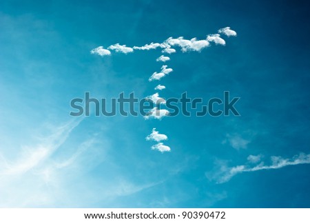clouds in the shape of a letter painted on a blue background