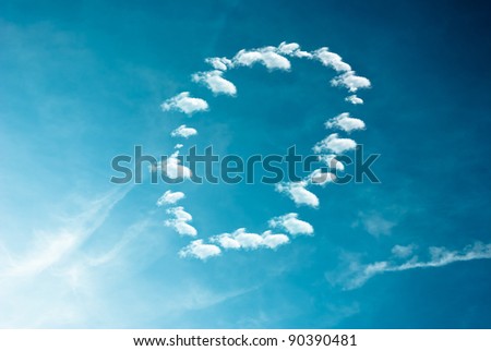 clouds in the shape of a letter painted on a blue background