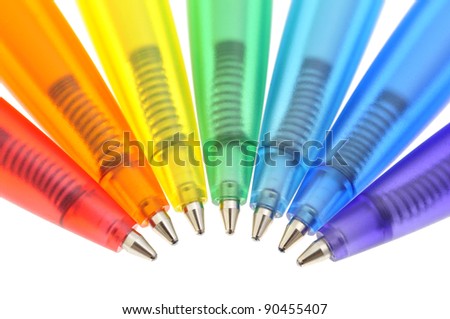 seven automatic colored ballpoint pens with springs in a row Royalty-Free Stock Photo #90455407