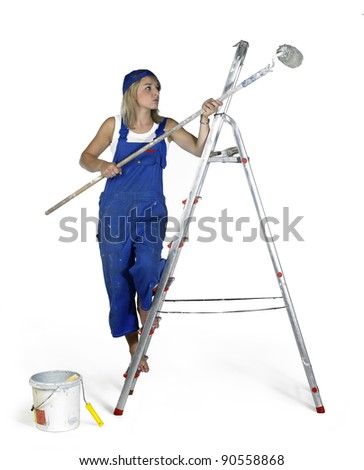 painting girl dressed in workwear standing on a metallic ladder in white back