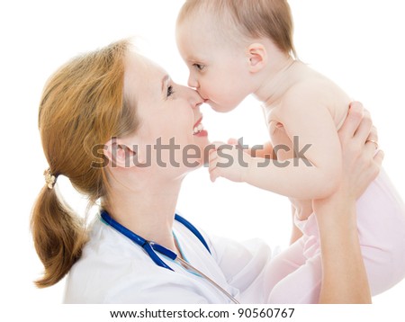 Doctor holding a baby in her arms on a white background.