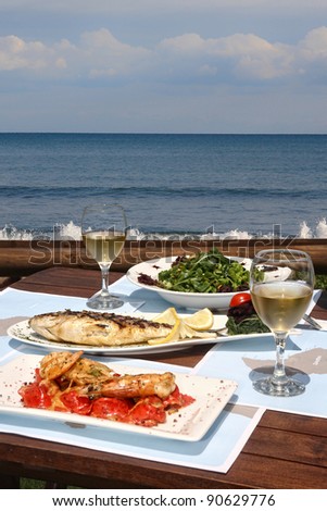 Lunch table for two by the sea
