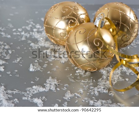 golden christmas balls with golden streamer. dark designet